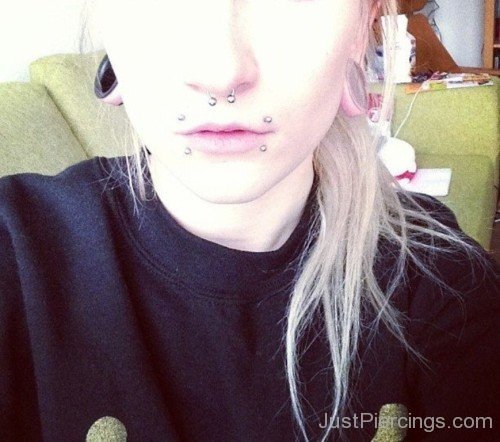 Lobe Stretching, Septum And Canine Bites Piercings-JP1060