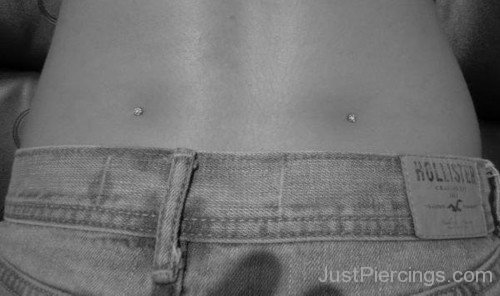 Lower Back Piercing With Silver Microdermals-JP12078