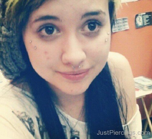 Septum And Butterfly Kiss Piercings On Both Sides-JP14095