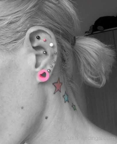 Conch Piercing And Stars Tattoo On Neck-JP1056