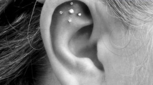 Cross Sign Cartilage Piercing On Ear-JP1038