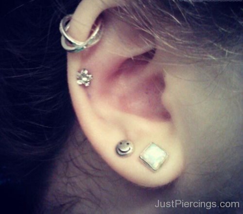 Dual Cartilage And Lobe Piercing With Smiley Stud-JP1041
