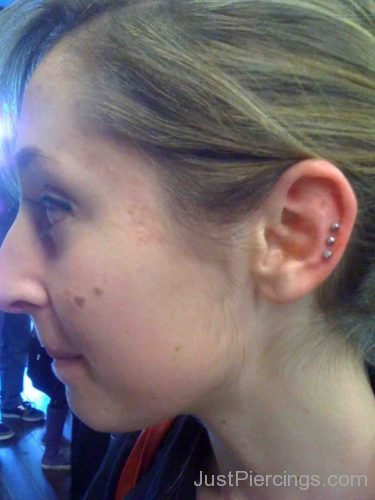 Tripple Cartilage Piercing On Girl Left Ear-JP184