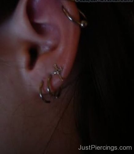 Tripple Lobe And Dual Cartilage Piercing On Left Ear-JP194