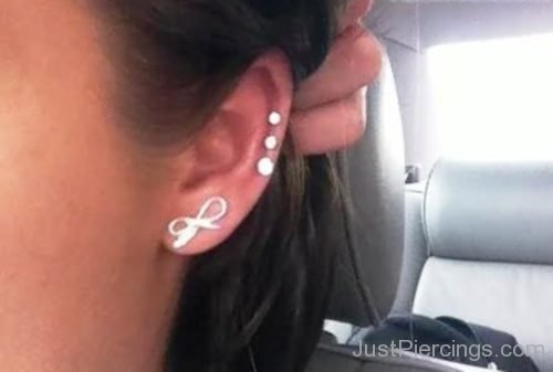 Bow Lobe And Tripple Cartilage Ear Piercings-JP1055