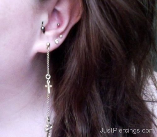 Conch And Lobe Piercing With Stylish Studs