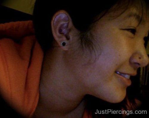 Conch Piercing And Lobe Stretching On Ear-JP1070
