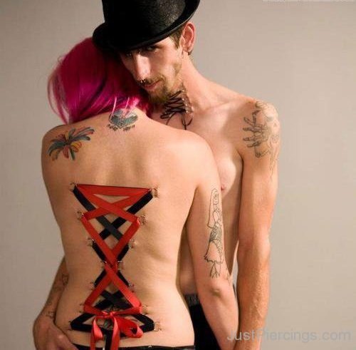 Couple With Corset Piercing And Tattoos-JP1115