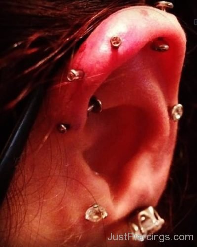 Ear Piercing With Small Metal Studs-JP1219
