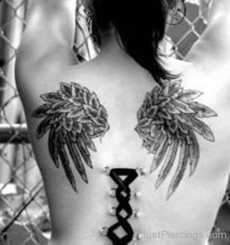 Feather Tattoos And Corset Piercing