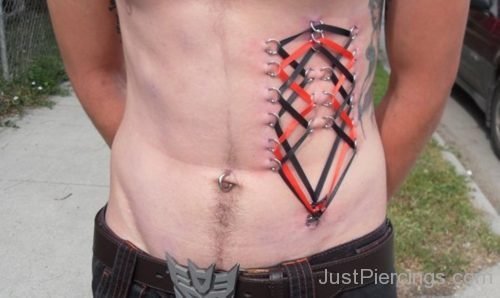 Guy With Corset Piercing On Hip-JP1122