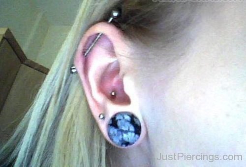 Industrial Conch And Lobe Piercing Closeup-JP1108