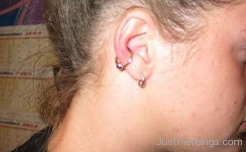 Lobe And Conch Piercing With Ring-JP1197