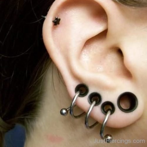 Lobe Stretchings With Spiral Barbell And Black Star Cartilage Ear Piercing-JP152