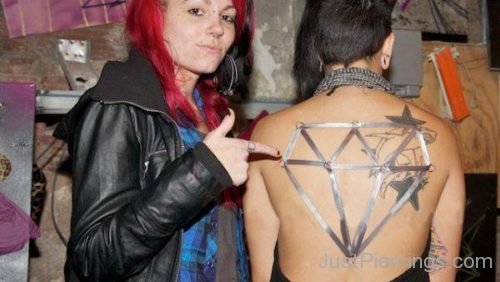 Star Tattoo And Diamond Corset Piercing On Back-JP1131
