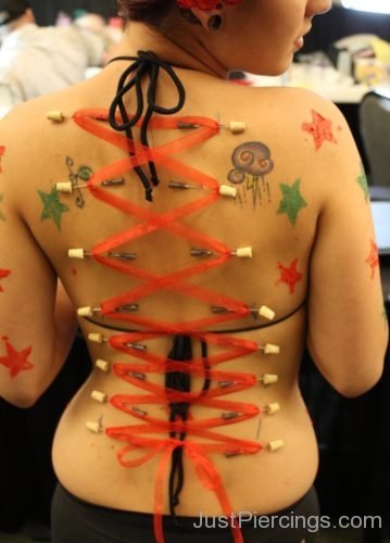 Star Tattoos And Corset Piercing-JP1156