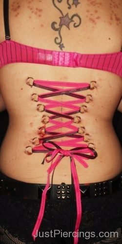 Stars Tattoo And Corset Piercing On Back-JP1147