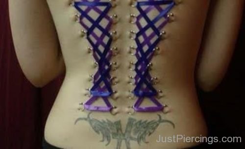 Tribal Tattoo On Lower Back And Back Corset Piercing-JP1154