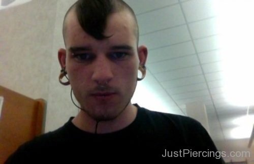 Ear Stretching And Vertical Eyebrow Piercing-JP1075