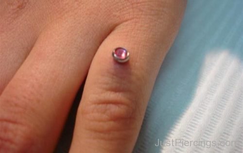 Finger Piercing With Pink Dermal-JP1095