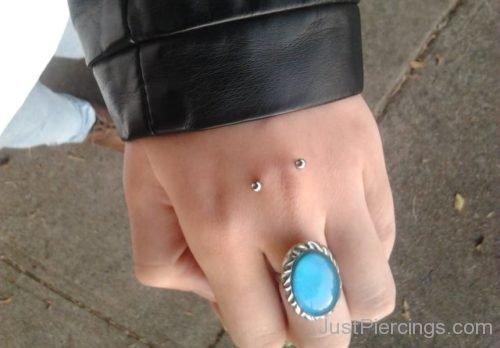 Hand Piercing With Ring And Surface Barbell-JP1095