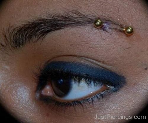 Horizontal Eyebrow Piercing With Gold Surgical Barbell-JP1186