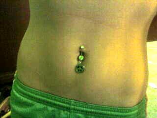 Peace sign belly ring.